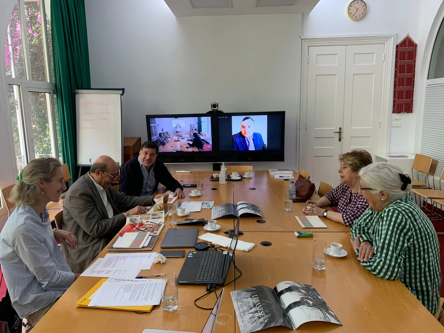 Mohammad El Rawas discussing exhibition reviews of the exhibition <i>Contemporary Lebanese Artists</i> at the roundtable discussion held at the Orient-Institut Beirut, 10 May 2024. From left to right: Nadia von Maltzahn, Mohammad El Rawas, Saleh Barakat, Nadine Begdache, Rose Issa. Image courtesy of Ashraf Osman.